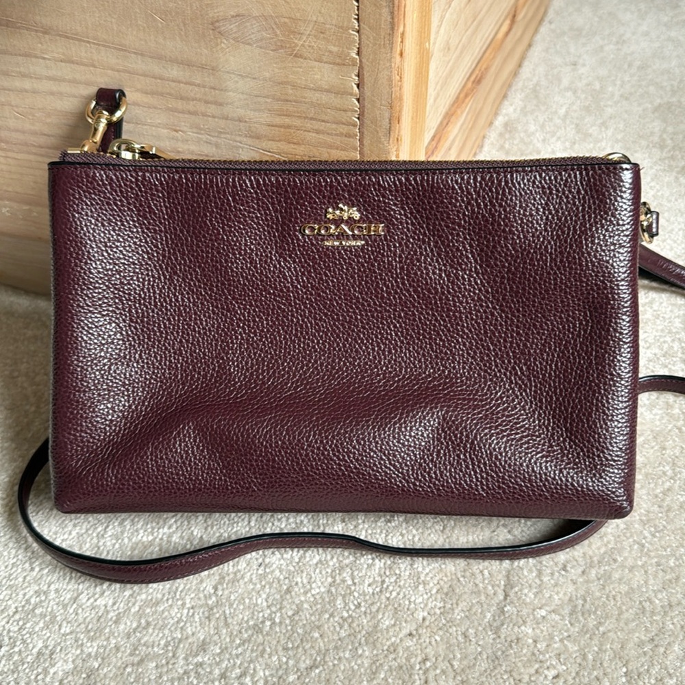Maroon Coach crossbody in soft leather